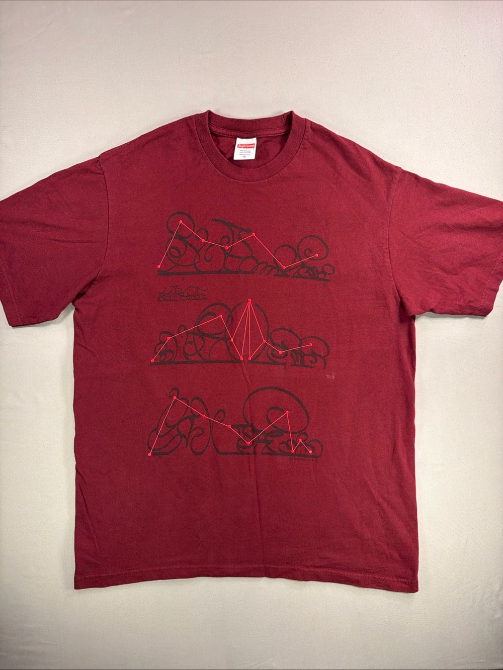 Supreme Maroon Short Sleeve Tee with Black & Red Graphic